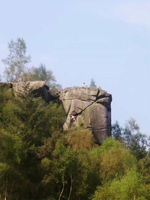 Rock climber on Cratcliff Tor
