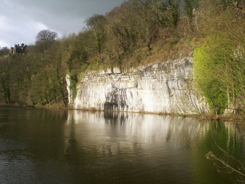 Water-cum-Jolly Dale. This is a beautiful dale, with a narrow path that skirts the river, which at this time of year is often flooded, as in the photograph. The limestone cliffs here are popular with rock climbers