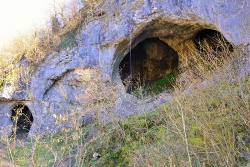 Dove Holes - The word Dove comes from the Saxon word 'Dubh', meaning black, the local rock climbers call the larger cave The Bat Cave! The larger cave is about 30ft high and 60ft wide. On the opposite side of the Dove, is Shepherd's Abbey Rocks and caves