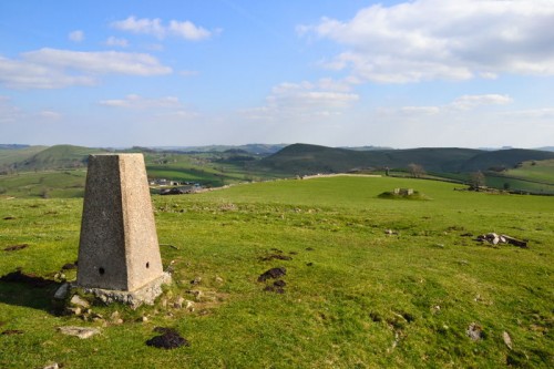 Trigpoint on Ecton Hill looking towards Wetton Hill